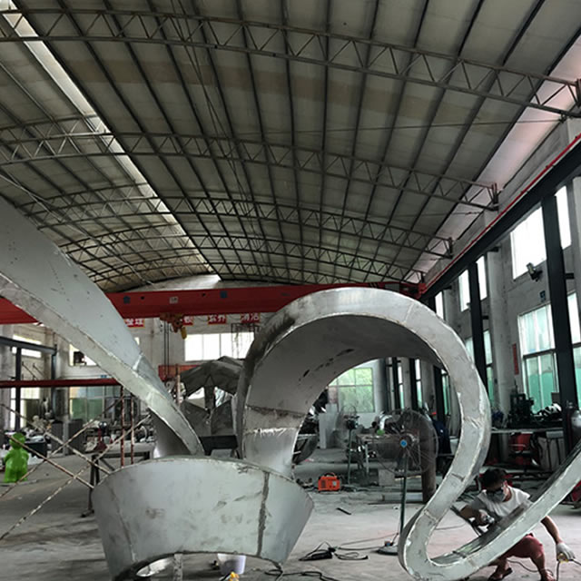 步行街復(fù)古不銹鋼雕塑